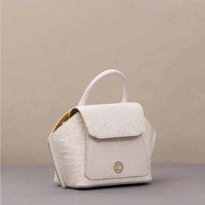 Cowskin Handbags, by POEII